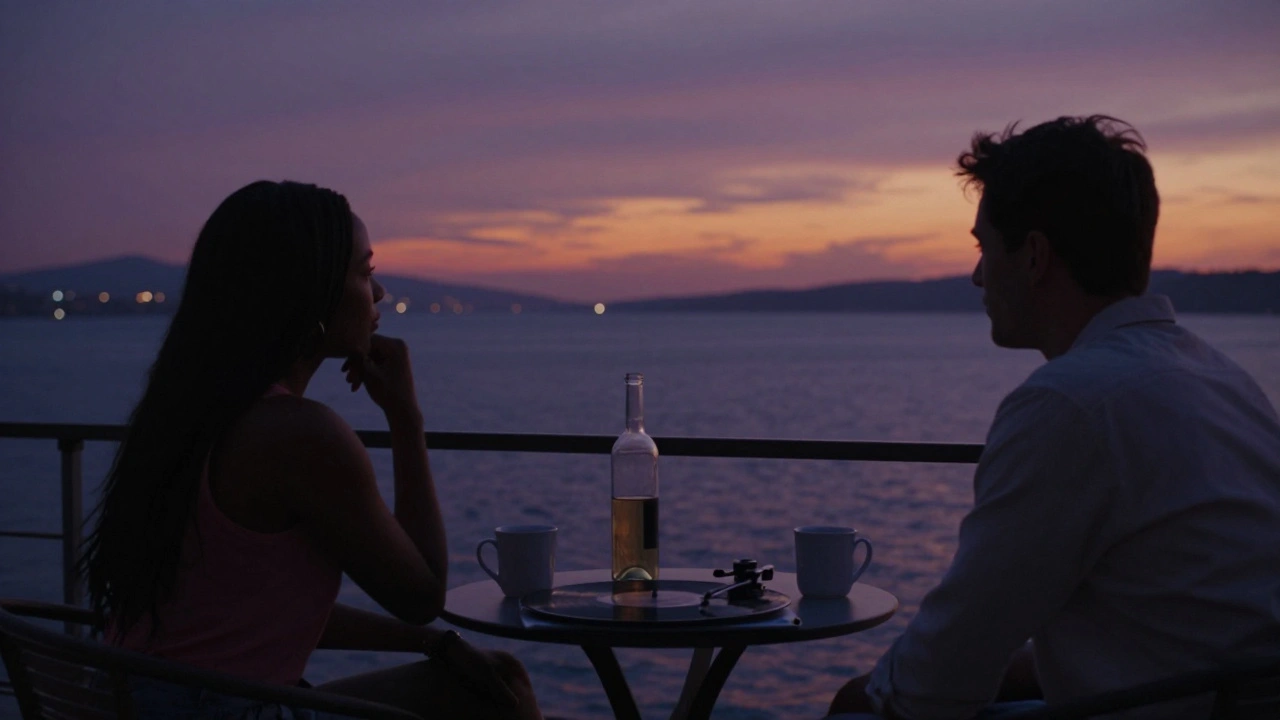 Silhouettes of two people on a villa terrace at sunset, sharing quiet moments over wine as the Sea of Marmara glows behind them.