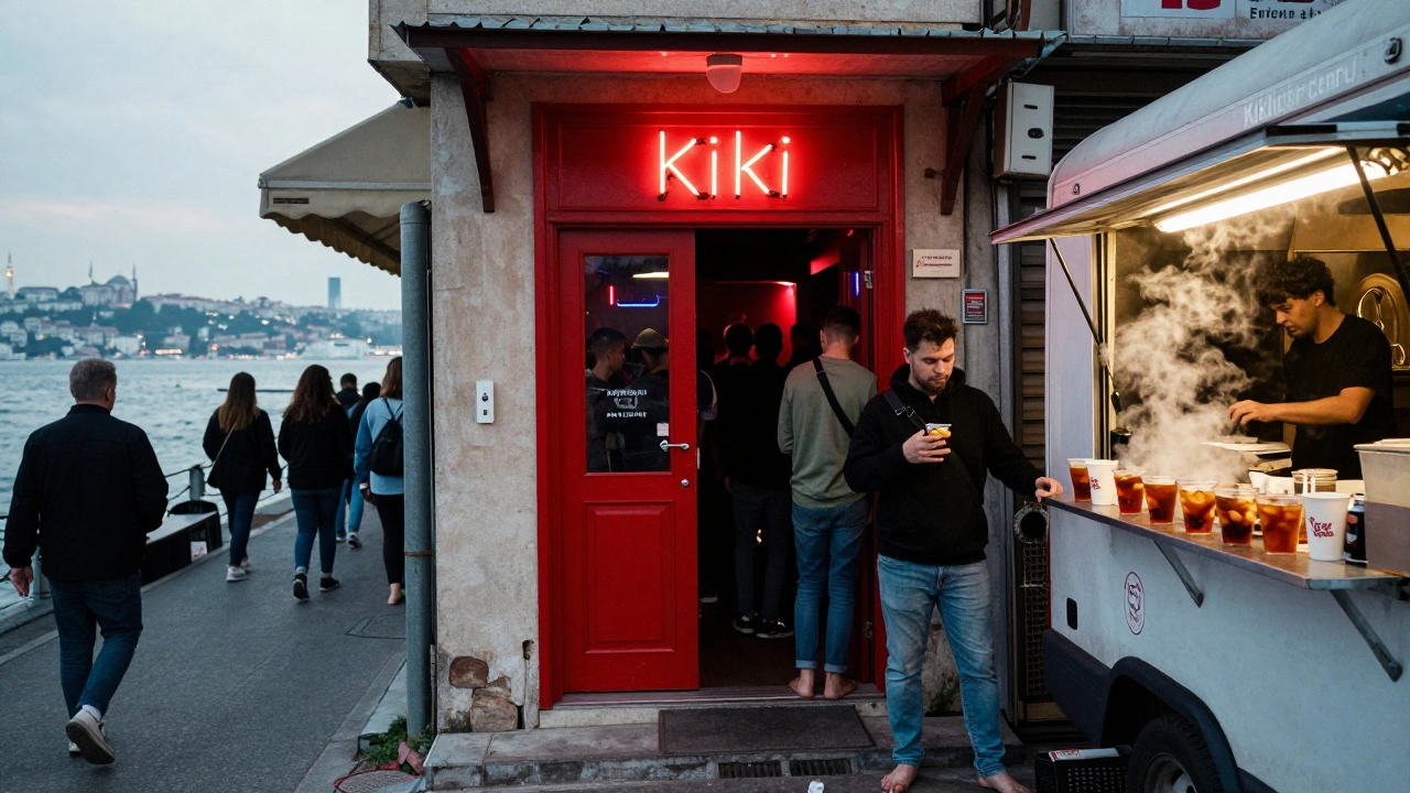 A red door at Kiki Nightclub with a neon sign, bouncer nodding as patrons enter, food truck outside at night.