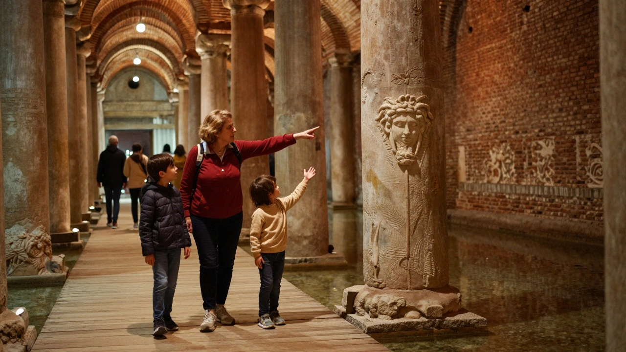 A Turkish family walks along wooden walkways in the cistern, grandmother pointing to the legendary Medusa heads.